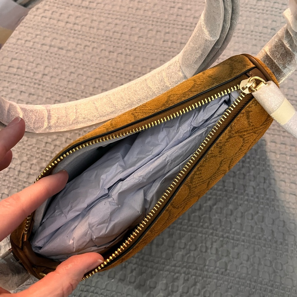 Coach Kailey Shoulder Bag
In Signature Suede - Picture 14 of 14
